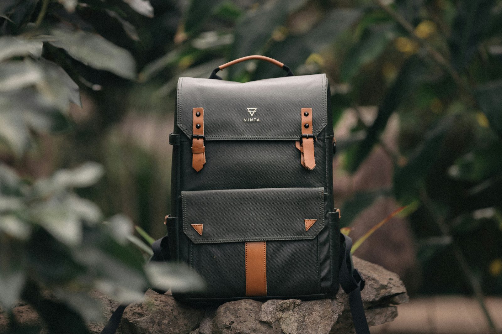 A structured backpack on a rock